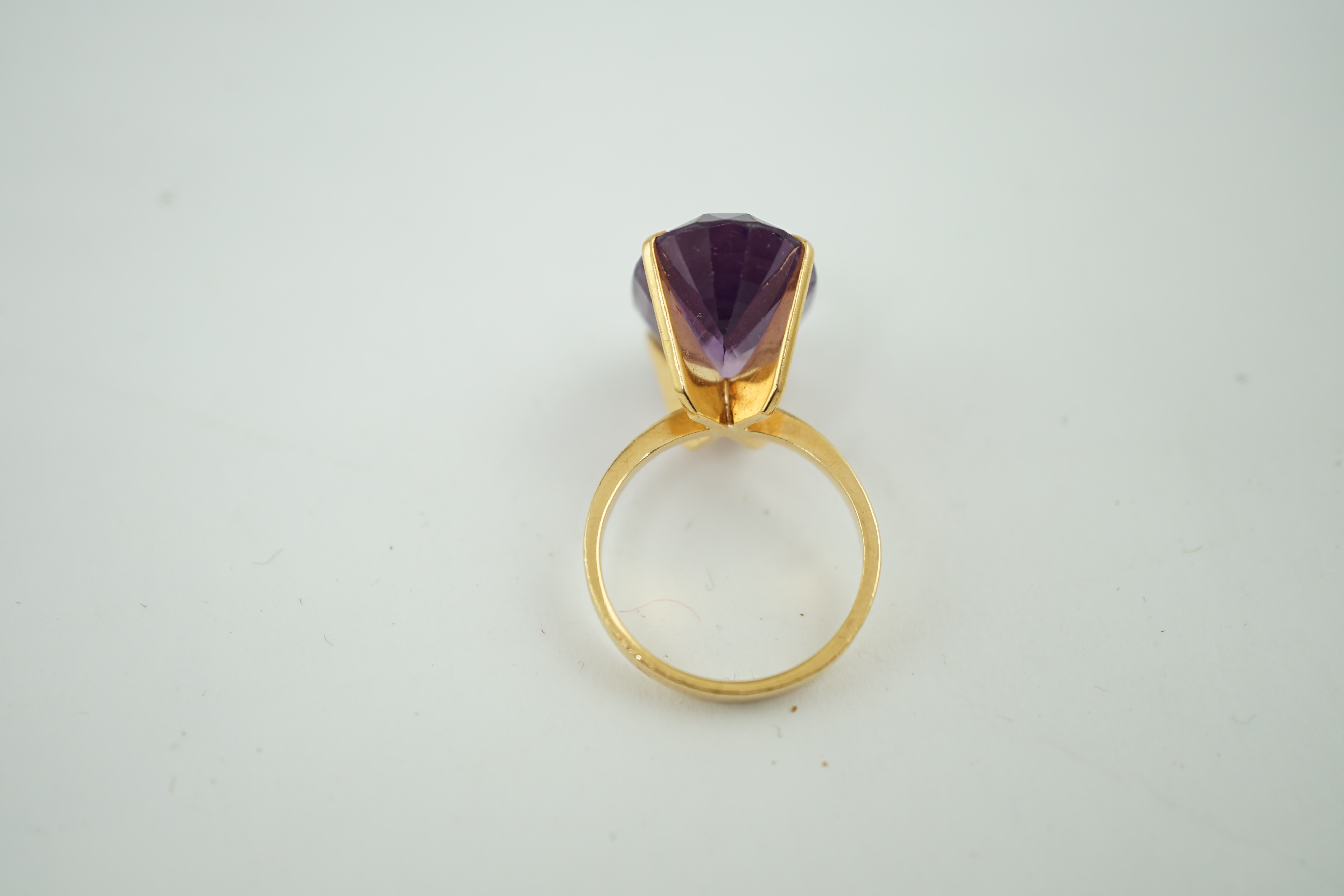 A mid 20th century French 18k gold and single stone oval cut amethyst set dress ring